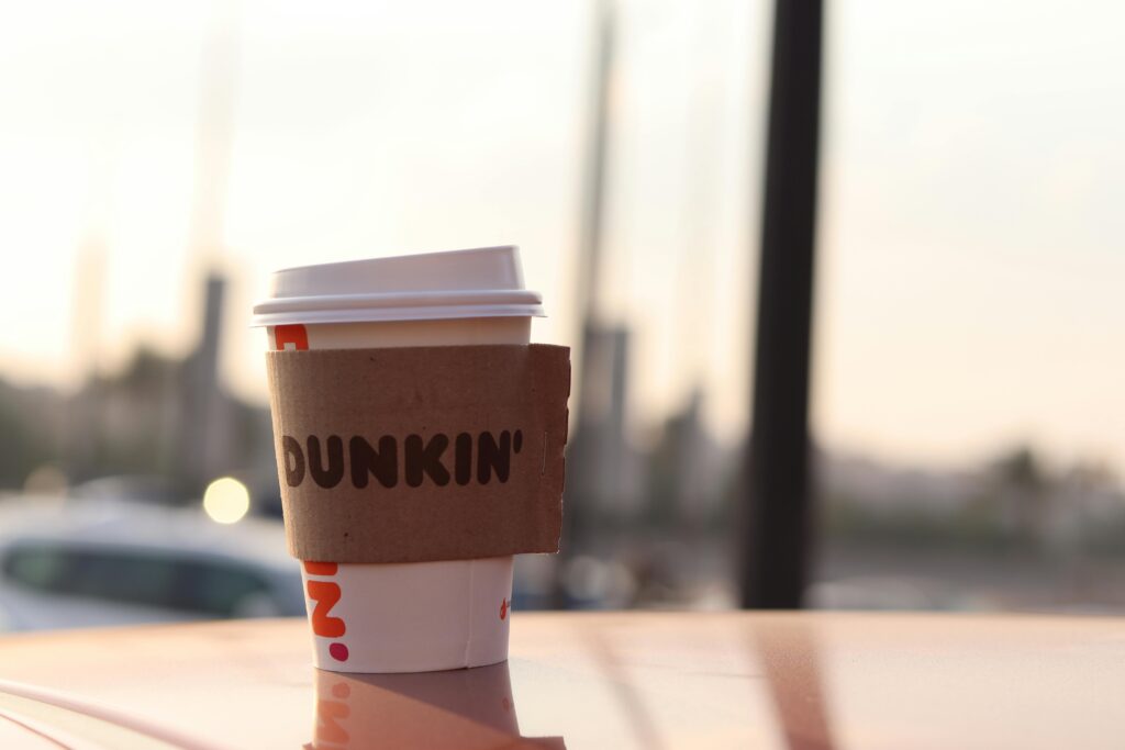 Dunkin coffee cup in sunlight